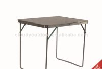 A Japanese Folding Table Made of Wood is Set at the Center of the Picture, Suitable for Eating ... A Japanese Folding Table Made of Wood is Set at the Center of the Picture, Suitable for Eating ...